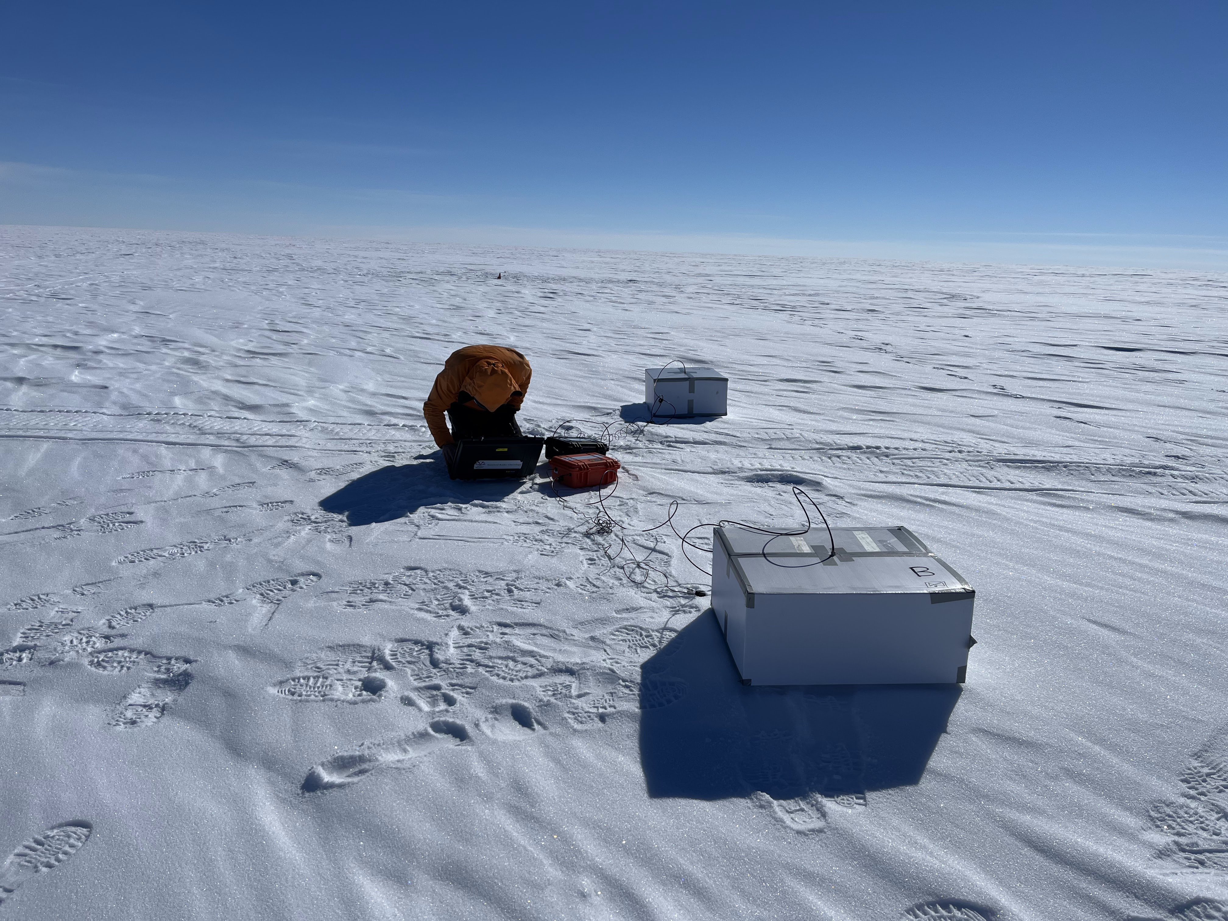 Figure 8. Paul setting up the transmitting receivers for a bistatic radar survey. Photo by Marianne Karplus.