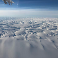 The glacier's ice breaks where it moves over ocean. Ted Scambos