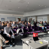 ITGC scientists listen to a talk at the recent meeting in Cambridge