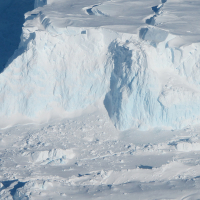 Thwaites Glacier meets the ocean. Credit: NASA/James Yungel